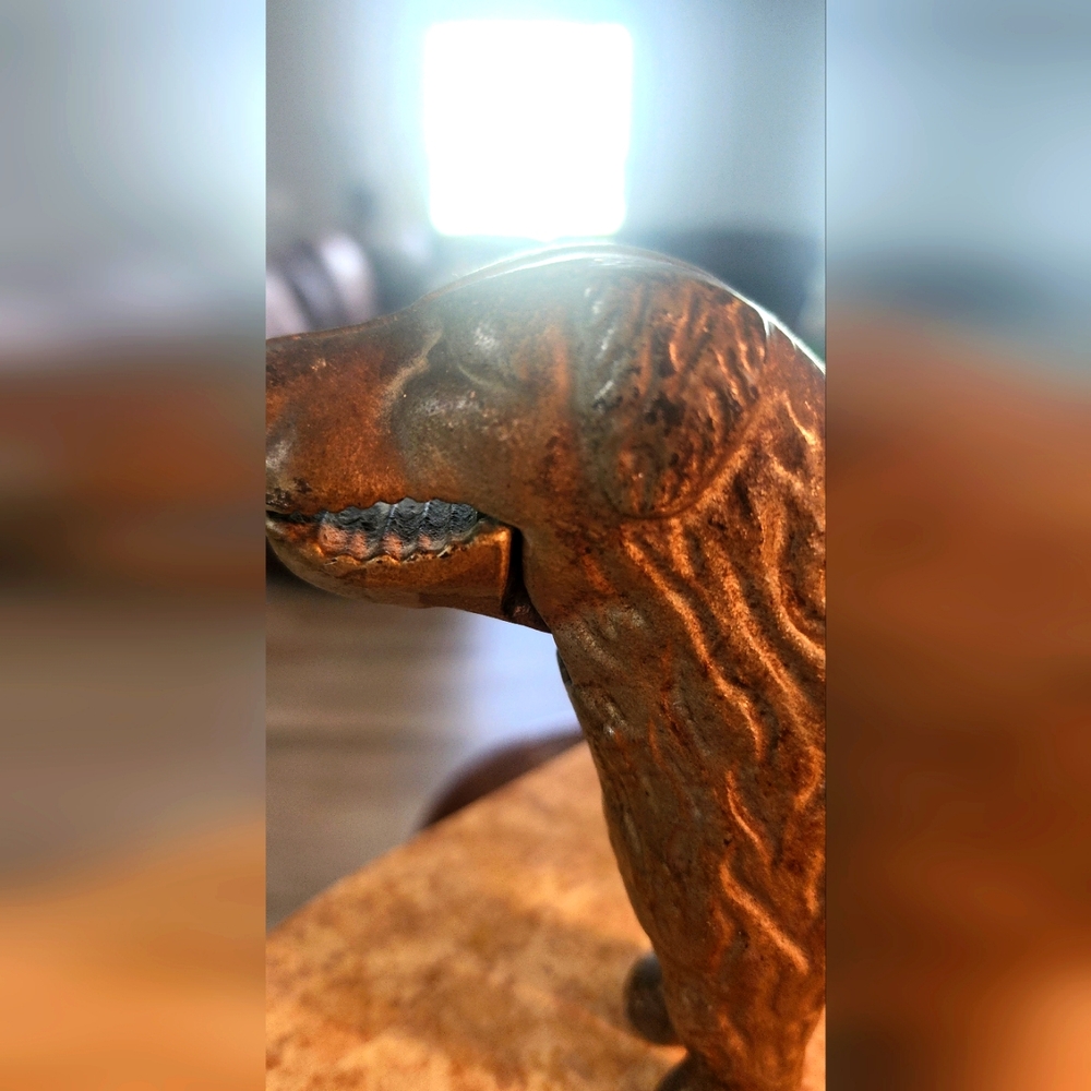 Vintage cast iron dog nut cracker